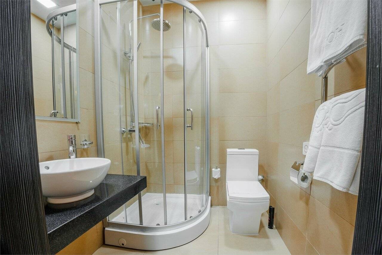 Фотографии номера Двухместный номер с 1 кроватью или 2 отдельными кроватями в Гостинице Аквамарин Курск