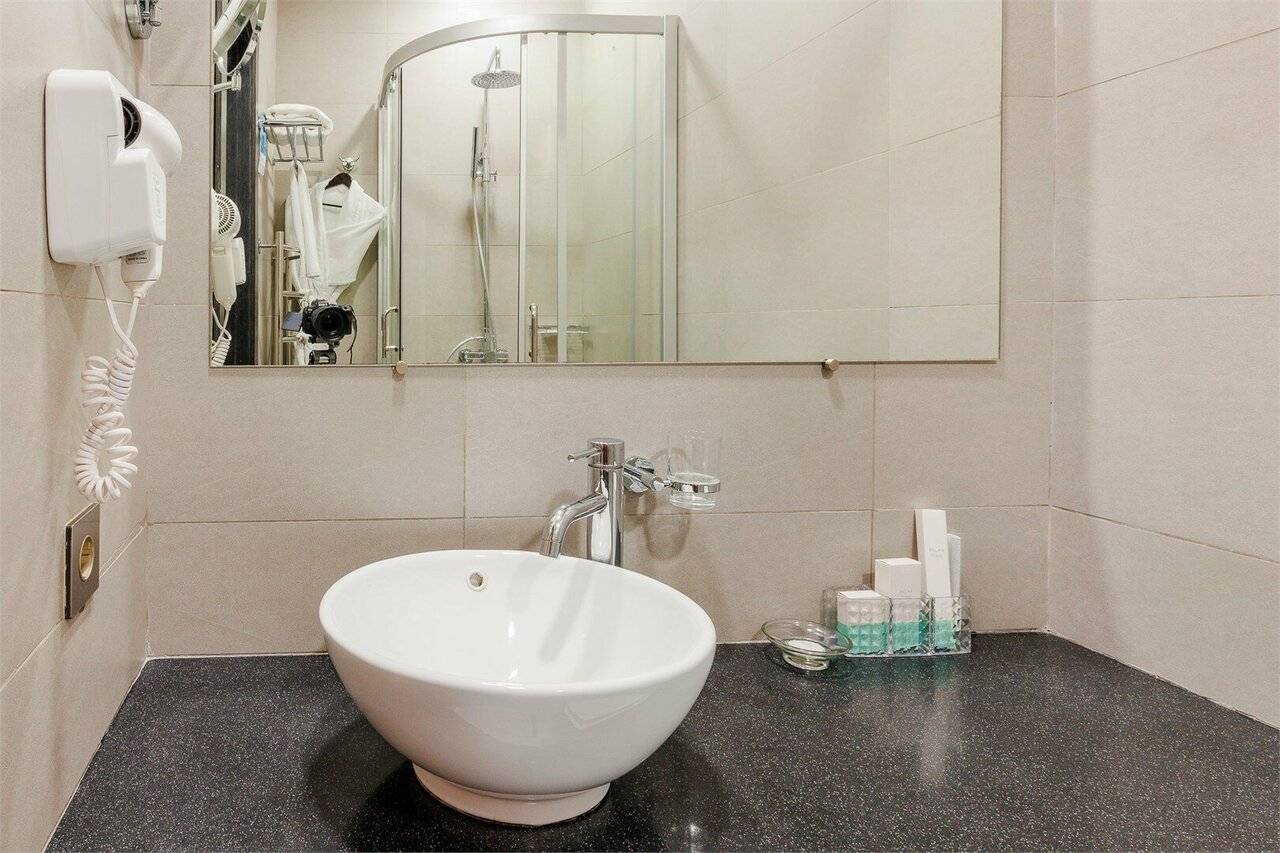 Фотографии номера Двухместный номер с 1 кроватью или 2 отдельными кроватями в Гостинице Аквамарин Курск