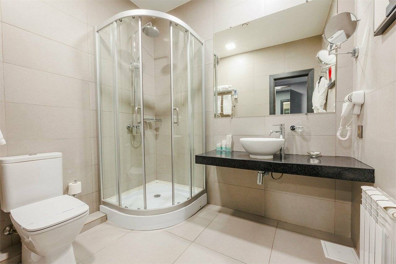 Фотографии номера Двухместный номер Делюкс с 1 кроватью или 2 отдельными кроватями в Гостинице Аквамарин Курск