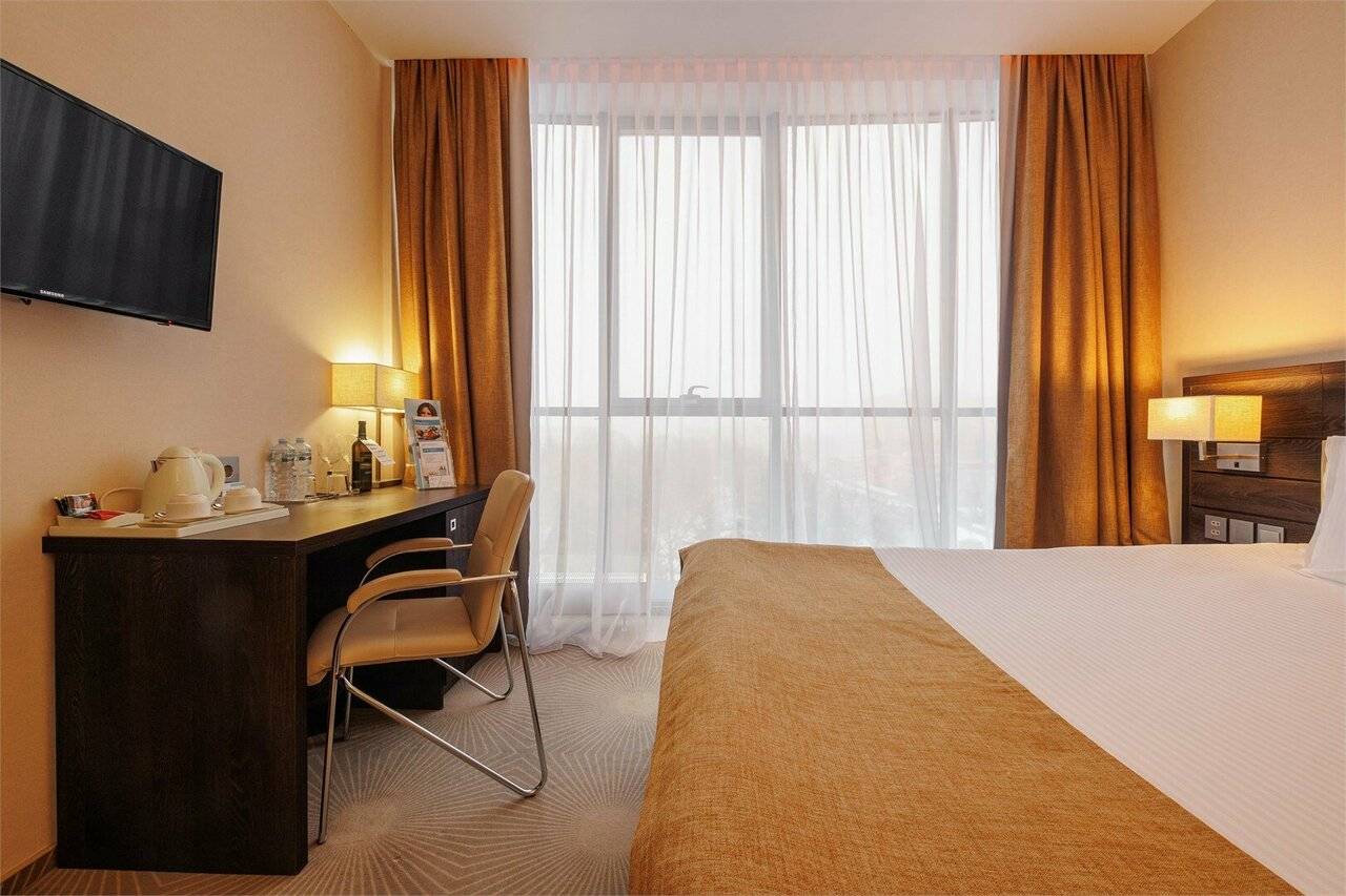 Фотографии номера Двухместный номер с 1 кроватью или 2 отдельными кроватями в Гостинице Аквамарин Курск