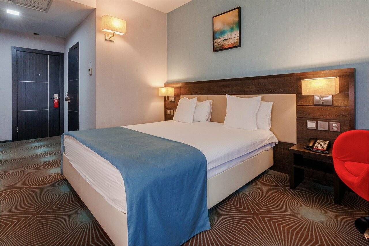 Фотографии номера Двухместный номер с 1 кроватью или 2 отдельными кроватями в Гостинице Аквамарин Курск