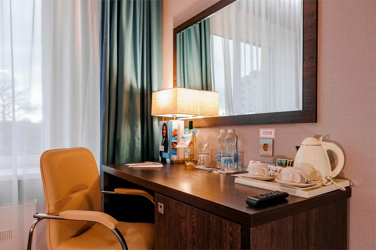 Фотографии номера Двухместный номер Делюкс с 1 кроватью или 2 отдельными кроватями в Гостинице Аквамарин Курск