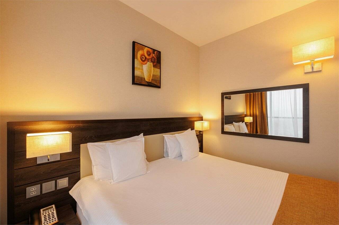 Фотографии номера Двухместный номер с 1 кроватью или 2 отдельными кроватями в Гостинице Аквамарин Курск