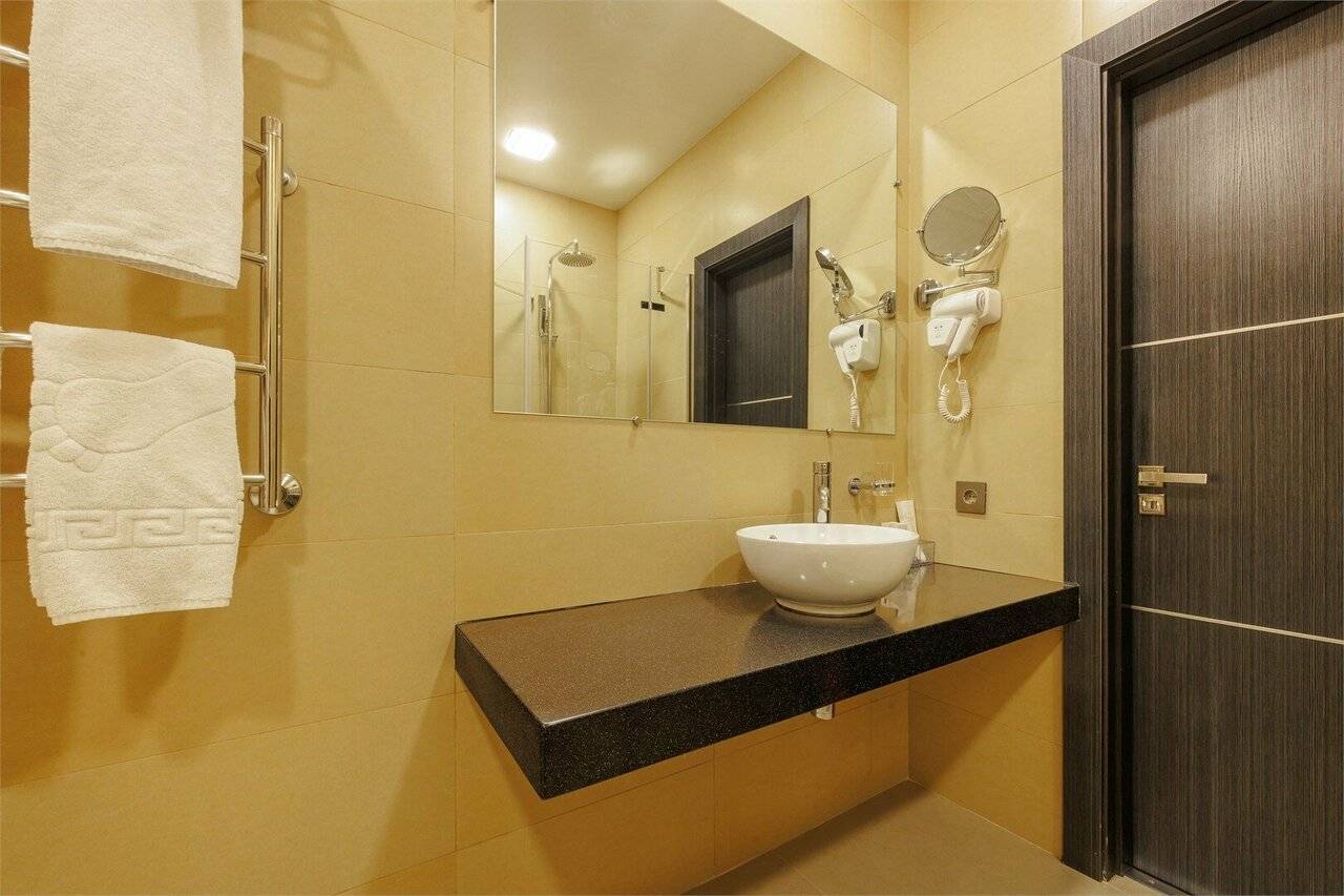 Фотографии номера Двухместный номер с 1 кроватью или 2 отдельными кроватями в Гостинице Аквамарин Курск