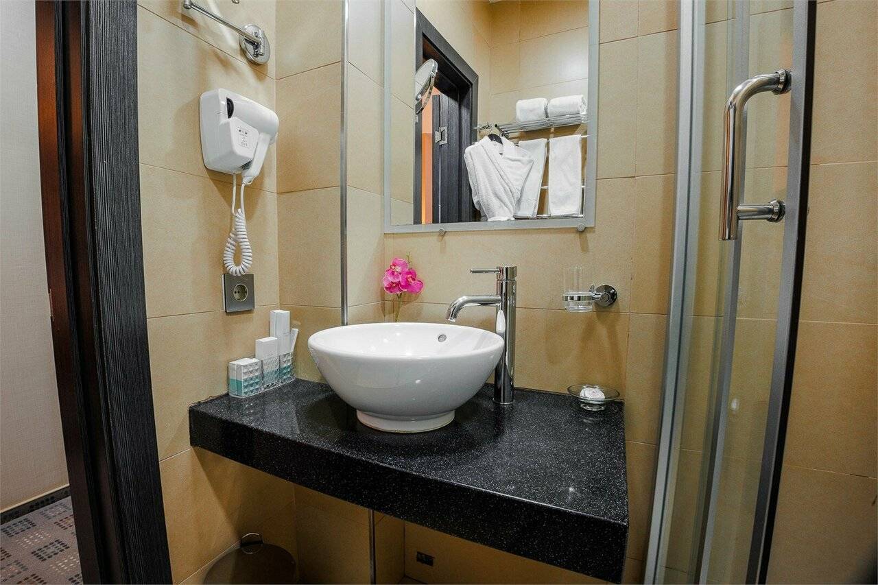 Фотографии номера Двухместный номер с 1 кроватью или 2 отдельными кроватями в Гостинице Аквамарин Курск