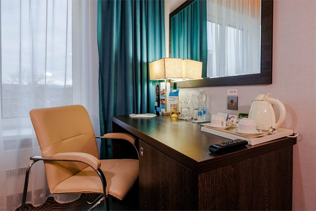 Фотографии номера Двухместный номер с 1 кроватью или 2 отдельными кроватями в Гостинице Аквамарин Курск